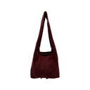 SAC A MAIN EN CUIR CLOUTÉ OR - MODÈLE "ALEXA"